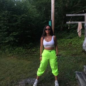 Green flashy pants